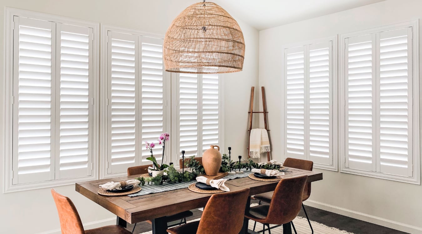 Plantation shutters in a dining room.